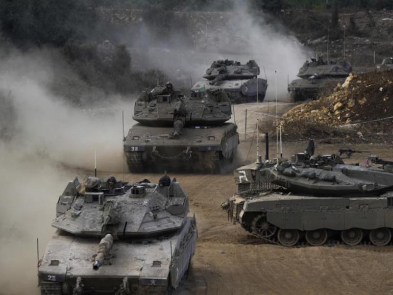 Israeli tanks have burst through the gates of the UN peacekeeping base in southern Lebanon. (AP PHOTO)