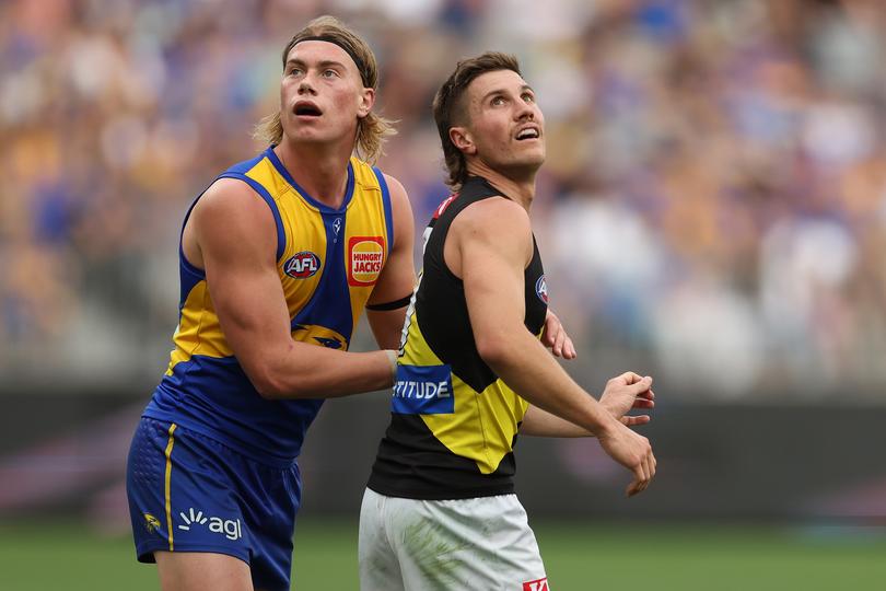 PERTH, AUSTRALIA - APRIL 14: Harley Reid of the Eagles defends Liam Baker of the Tigers during the 2024 AFL Round 05 match between the West Coast Eagles and the Richmond Tigers at Optus Stadium on April 14, 2024 in Perth, Australia. (Photo by Will Russell/AFL Photos)