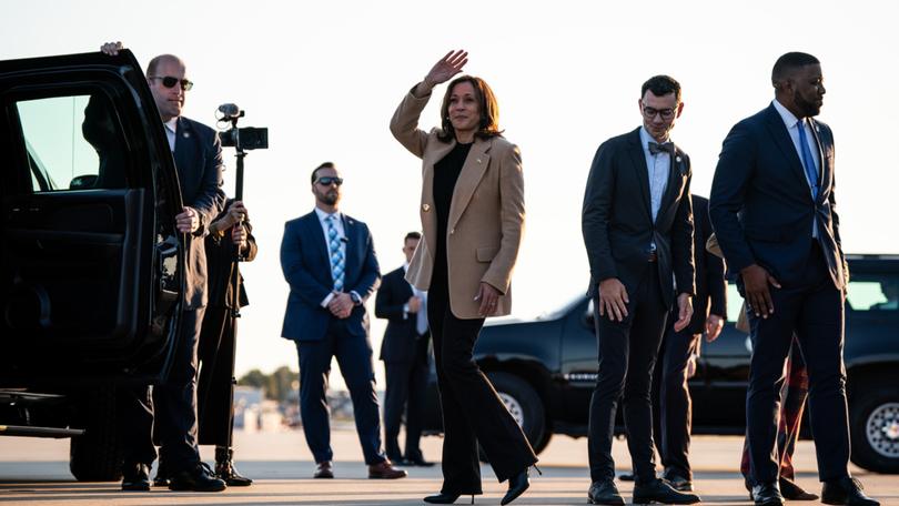 Vice President Kamala Harris, the Democratic presidential nominee, waves as she arrives in Raleigh, NC.