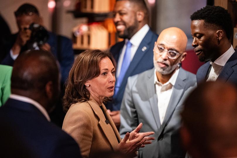 Vice President Kamala Harris greets guests as she visits The Pit Authentic Barbecue who are helping with Hurricane Helene relief.