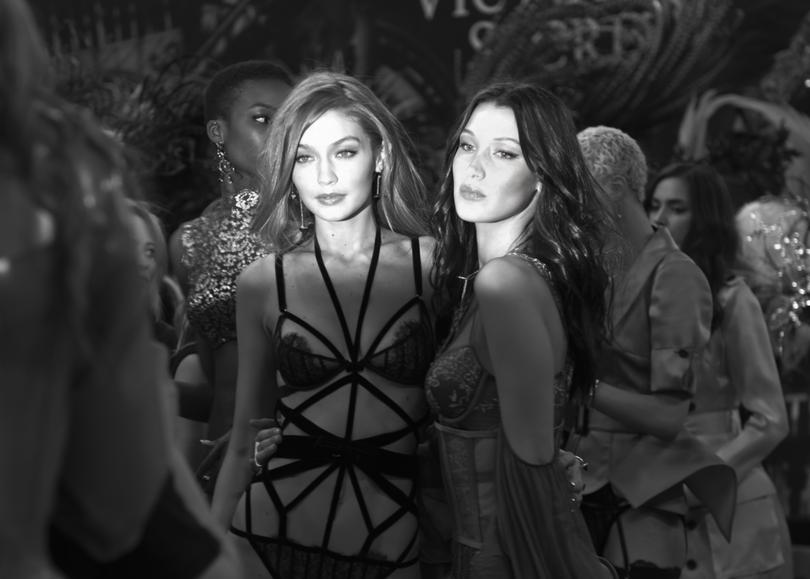 Gigi Hadid, pictured at left with sister Bella Hadid, will return to the runway for the new Victoria’s Secret show.