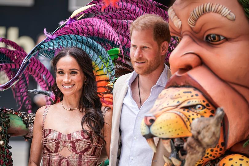 Meghan, Duchess of Sussex and Prince Harry, Duke of Sussex pose for a photo at Centro Nacional de las Artes Delia Zapata during a visit to Colombia on August 15, 2024 in Bogota, Colombia. 