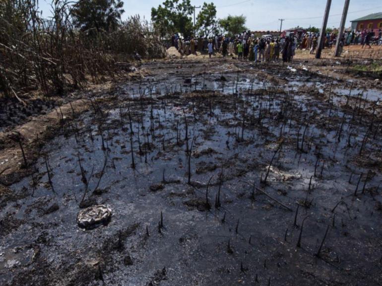 Residents of Majiya are in mourning after a fuel tanker explosion killed at least 140 people. (AP PHOTO)