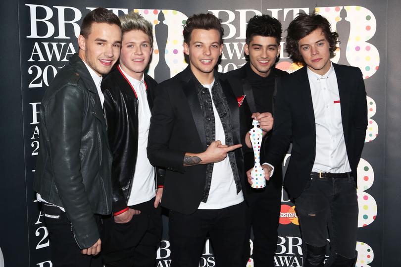 FILE - OCTOBER 16: Singer Liam Payne, a former member of One Direction, died after falling from a hotel in Buenos Aires, Argentina. He was 31 years old. LONDON, ENGLAND - FEBRUARY 20:  (L-R) Liam Payne, Niall Horan, Louis Tomlinson, Zayn Malik and Harry Styles of One Direction pose with their Brits Global Success Award in the press room at the Brit Awards 2013 at the 02 Arena on February 20, 2013 in London, England.  (Photo by Tim Whitby/Getty Images)