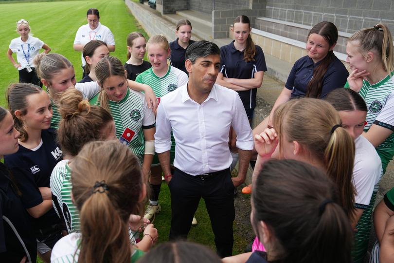 WANTAGE, ENGLAND - JUNE 3:  Prime Minister Rishi Sunak participates in football activities with a local school girls football team as he visits Alfredian Park, home of Wantage Town Football Club, on June 3, 2024 in Wantage, England. Since announcing that the UK General Election will be held on July 4th, Rishi Sunak has visited key battleground regions across the UK. (Photo by Carl Court/Getty Images) *** BESTPIX ***