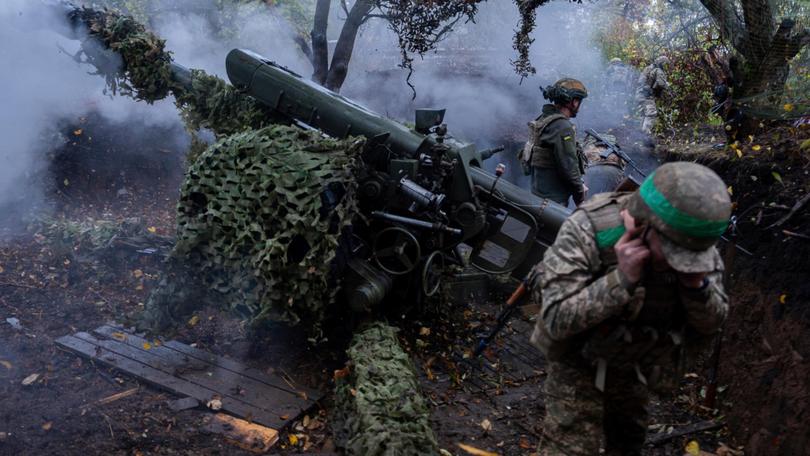 Ukrainian servicemen of Khartia brigade fire D-30 Howitzer towards Russian positions in Kharkiv region, Ukraine.