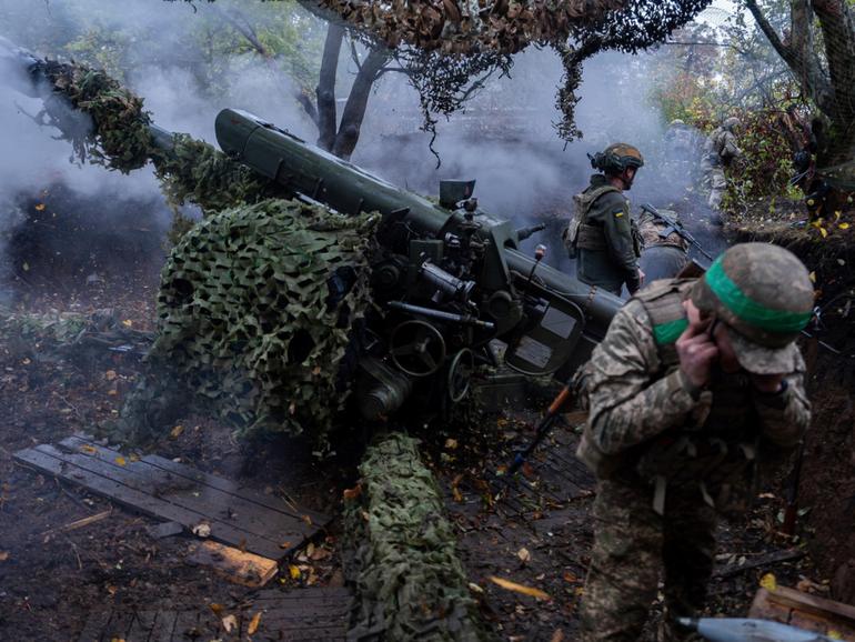 Ukrainian servicemen of Khartia brigade fire D-30 Howitzer towards Russian positions in Kharkiv region, Ukraine.