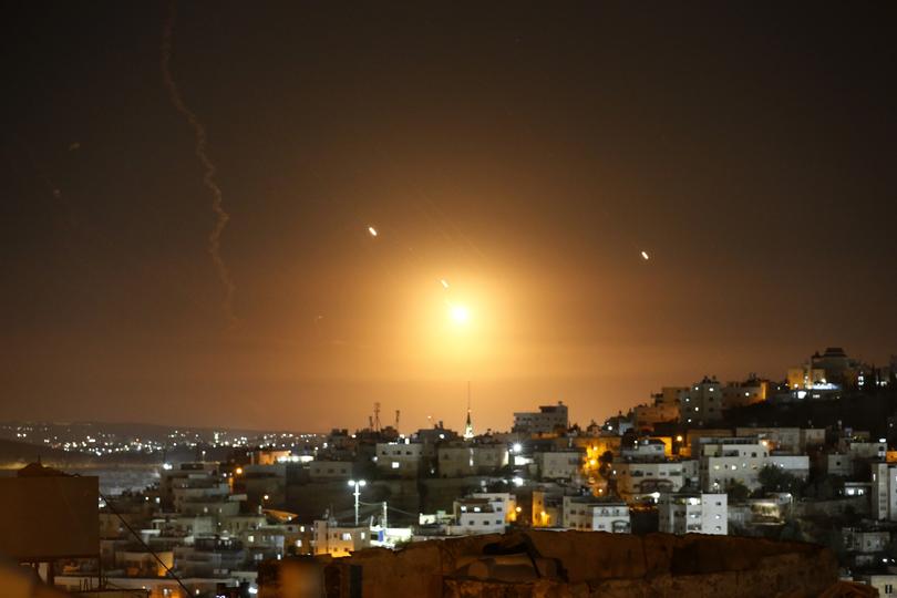 Many rockets, fired from Iran, are seen over Jerusalem from Hebron, West Bank on October 01, 2024. The Israeli army announced that missiles were fired from Iran towards Israel and sirens were heard across the country, especially in Tel Aviv. 