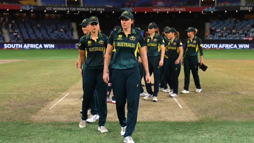 Tahlia McGrath of Australia looks dejected as she leads Australia off the field.