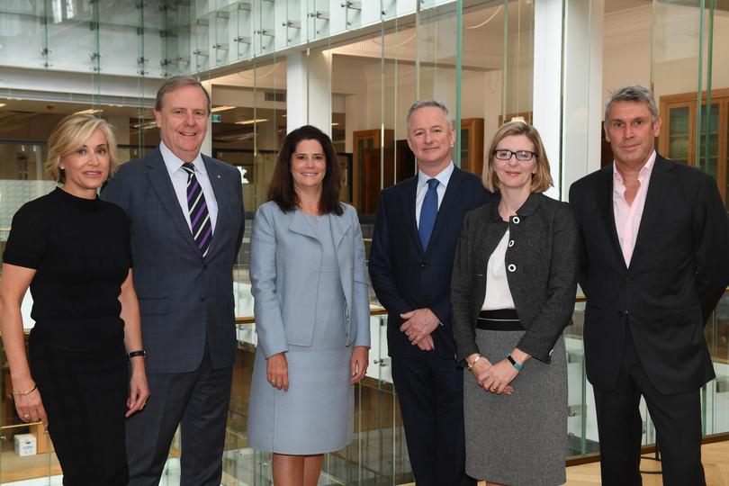 Nine Entertainment board members (lt-rt) Janette Kendall, Chairman Peter Costello, Catherine West, CEO Hugh Marks, Samantha Lewis and David Gyngell pose for a photograph ahead of the Nine Entertainment Annual General Meeting in Sydney, Monday, November 13, 2017. (AAP Image/Dean Lewins) NO ARCHIVING