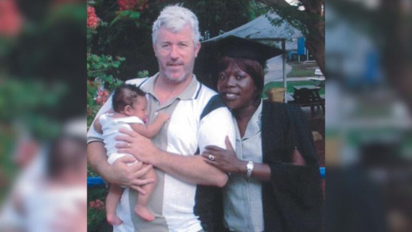 Glenn, Grace and one of their two children.