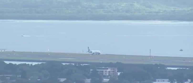 Dozens of crews rushed onto the tarmac following a bomb scare involving Air New Zealand flight NZ247 from Wellington.