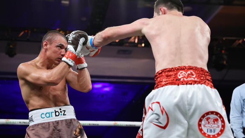 Tim Tszyu (left) during the IBF super-welterweight world title fight against Russian Bakhram Murtazaliev.