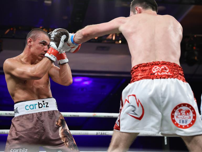 Tim Tszyu (left) during the IBF super-welterweight world title fight against Russian Bakhram Murtazaliev.