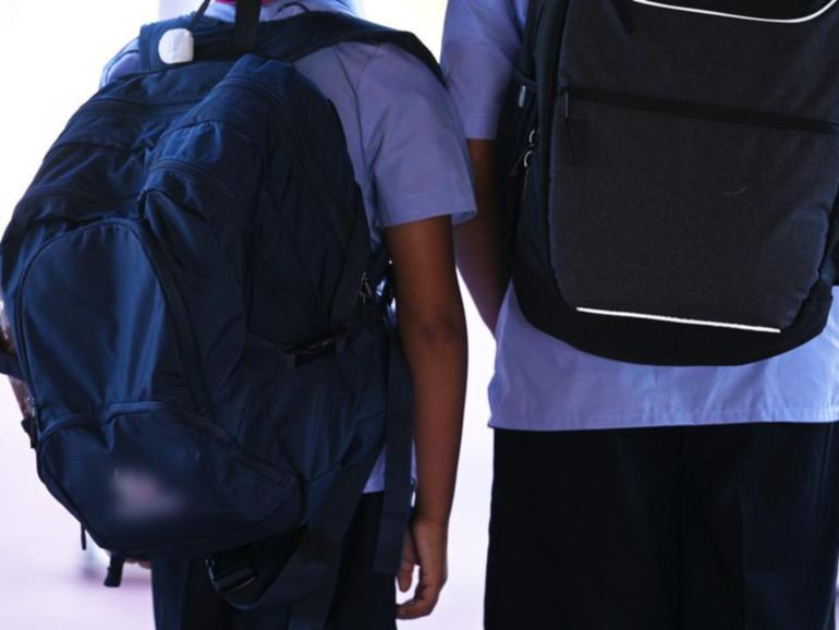 Some 95 per cent of NSW public school principals support a ban on mobile phones in the classroom. (Dean Lewins/AAP PHOTOS)