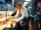 Former President Donald Trump works behind the counter making french fries during a visit to McDonald's restaurant in Feasterville-Trevose, Pennsylvania. 