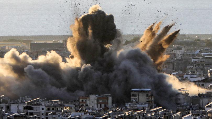 A cloud of smoke erupts following an Israeli airstrike on Beirut's southern suburbs on the weekend.