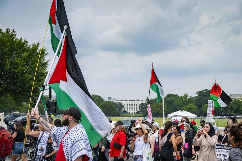 Protesters march outside the White House as Israeli Prime Minister Benjamin Netanyahu meets with President Joe Biden and Vice President Kamala Harris in Washington on July 25. 