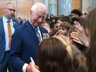 King Charles greets students after attending a parliamentary reception in Canberra. (Lukas Coch/AAP PHOTOS)