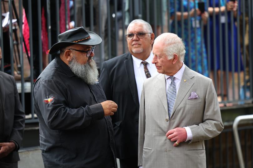 SYDNEY, AUSTRALIA - OCTOBER 22: Leon Donovan (L), a member of the Indigenous community, speaks with King Charles III during a visit to the National Centre for Indigenous Excellence on October 22, 2024 in Sydney, Australia. The King's visit to Australia is his first as monarch, and the Commonwealth Heads of Government Meeting (CHOGM) in Samoa will be his first as head of the Commonwealth. (Photo by Toby Melville-Pool/Getty Images)