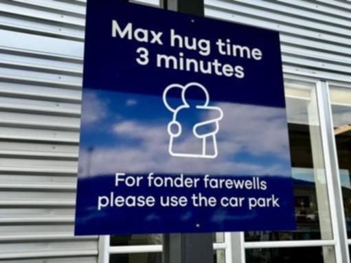 Dunedin Aiport has placed a time limit on hugging.