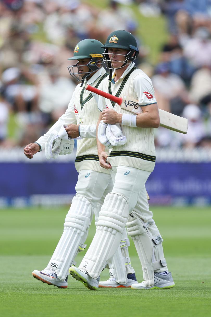 WELLINGTON, NEW ZEALAND - FEBRUARY 29: Usman Khawaja and Marnus Labuschagne of Australia leave the field for lunch during day one of the First Test in the series between New Zealand and Australia at Basin Reserve on February 29, 2024 in Wellington, New Zealand. (Photo by Hagen Hopkins/Getty Images)