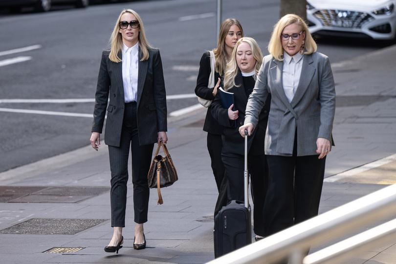 ##USAGE FEES APPLY### Linda Rogan steps into the Federal Court in Sydney where she is contesting a bankruptcy notice sent to her by billionaire Richard White. Photo Nick Moir 1 October 2024