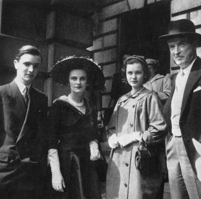 The Duchess of Argyll (formerly, Margaret Whigham and later, Mrs Charles Sweeney), pictured with her husband the Duke of Argyll and her two children from her previous marriage, Bryan and Frances, later Duchess of Rutland. 