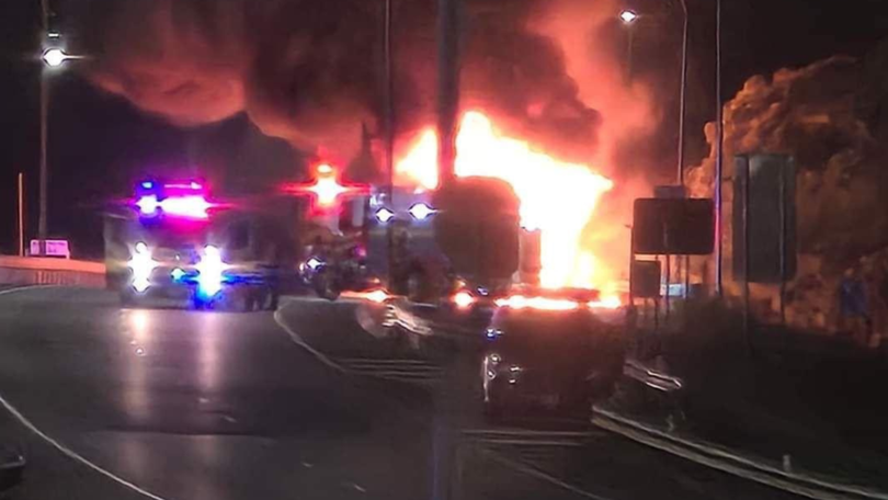 A B-double truck has erupted in flames following a crash on a major Queensland motorway.