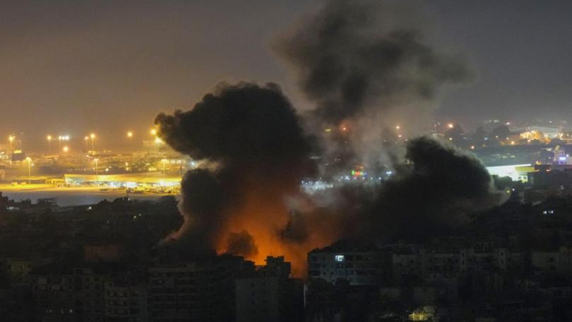 Smoke rises from an Israeli airstrike in Dahiyeh, Beirut.