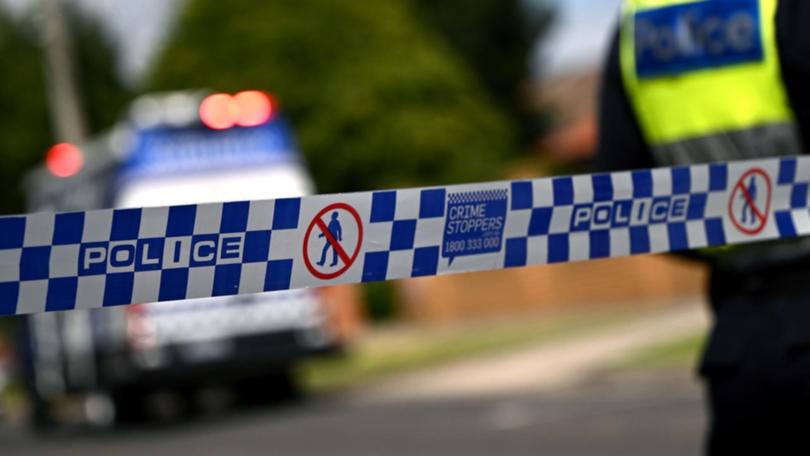 A man has been found dead inside a Melbourne unit complex after reports of a disturbance. 