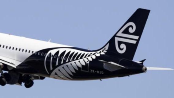 An Air New Zealand flight bound for Auckland from Perth was redirected to Melbourne Airport on Wednesday morning, when Australian Federal Police officers swooped on the aircraft.