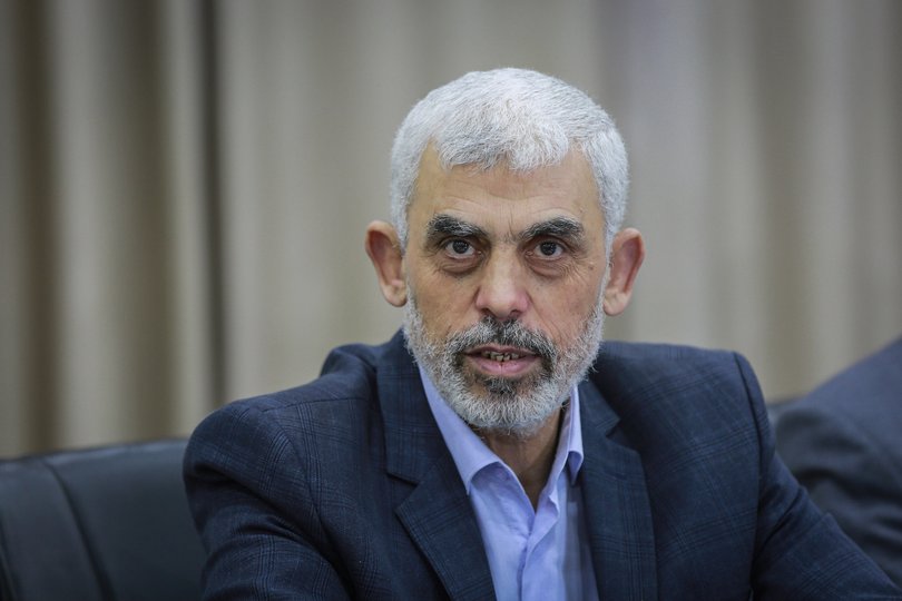 13 April 2022, Palestinian Territories, Gaza City: Yahya Sinwar, leader of the Palestinian Hamas Islamist movement hosts a meeting with members of Palestinian factions over the escalation of tensions between Israel and the Palestinians in the West Bank and Jerusalem, at Hamas President's office in Gaza City. Photo: Mohammed Talatene/dpa (Photo by Mohammed Talatene/picture alliance via Getty Images)