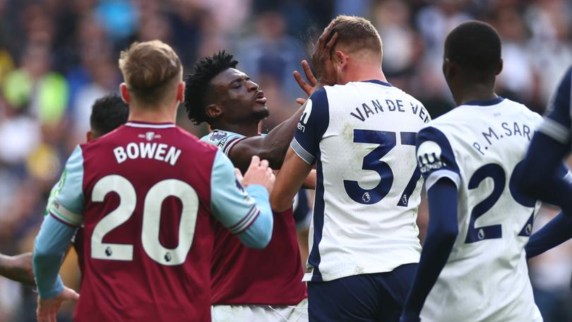 Mohammed Kudus of West Ham United clashes with Micky van de Ven of Tottenham Hotspur.