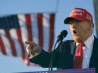 A man was found with guns and ammunition at a security checkpoint near Donald Trump's rally.  (AP PHOTO)