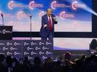 Former US President and Republican presidential candidate Donald Trump dances onstage during a campaign rally at the Gas South Arena in Duluth, Georgia, on October 23, 2024. (Photo by CHRISTIAN MONTERROSA / AFP) CHRISTIAN MONTERROSA