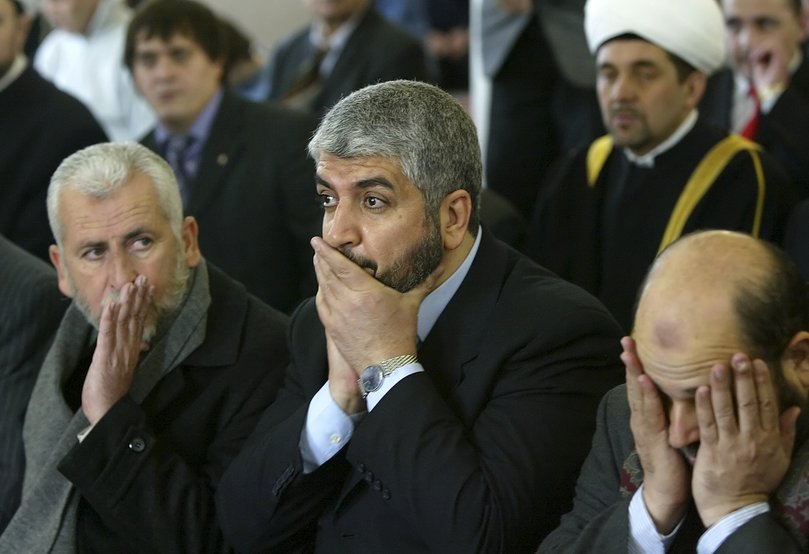 Khaled Mashaal, centre, Hamas political chief, and members of the delegation Moussa Abu Marzouk, right, and Said Siyam.