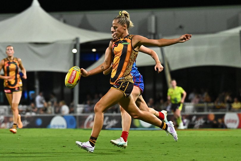 Kaitlyn Ashmore of the Hawks kicks.