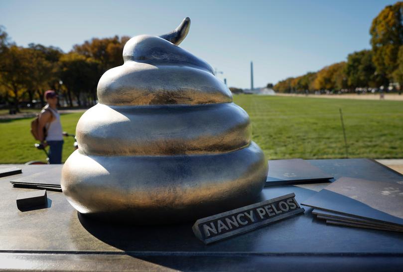 WASHINGTON, DC - OCTOBER 24: A satirical art installation that "honors" those who participated in the Jan 6, 2021 riot at the U.S. Capitol is seen on the National Mall in on October 24, 2024 in Washington, DC. The temporary art installation depicts an emoji-style poop on top of then-Speaker of the House Nancy Pelosi’s desk. (Photo by Kevin Dietsch/Getty Images) Kevin Dietsch