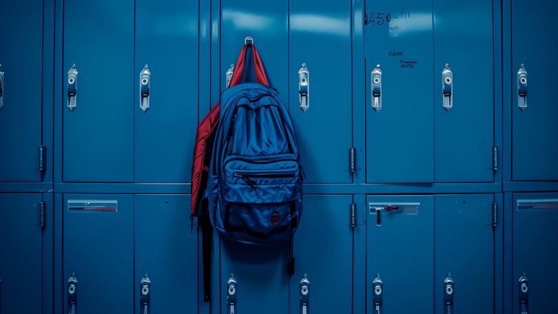 A 14-year-old high school student assaulted by 12 other students has been awarded $1.2 million in compensation by a court.