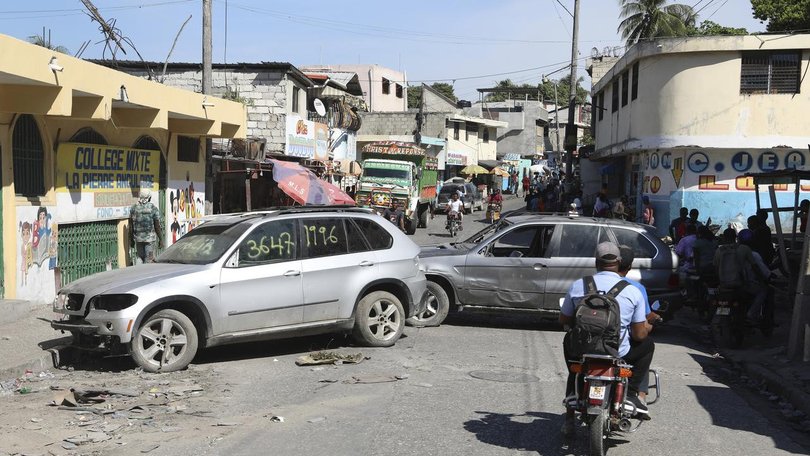 People are fleeing their homes in Port-au-Prince as gangs terrorise the population. (AP PHOTO)