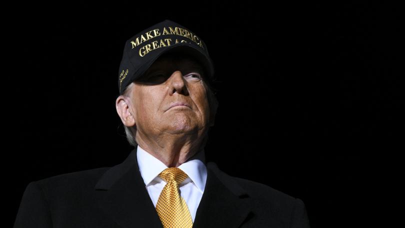 Former President Donald Trump, the Republican presidential nominee, during a campaign rally in Traverse City, Mich., on Friday, Oct. 25, 2024. A campaign marked by TrumpÕs apocalyptic extremes has turned even darker in its final days, as he threatens to prosecute and imprison a wide range of people involved in elections and politics. (Kenny Holston/The New York Times)
