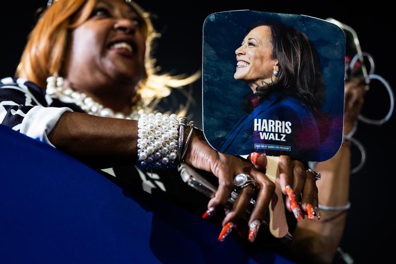 Supporters of Vice President Kamala Harris listen to remarks during her campaign rally Thursday night in Clarkston, Georgia. 