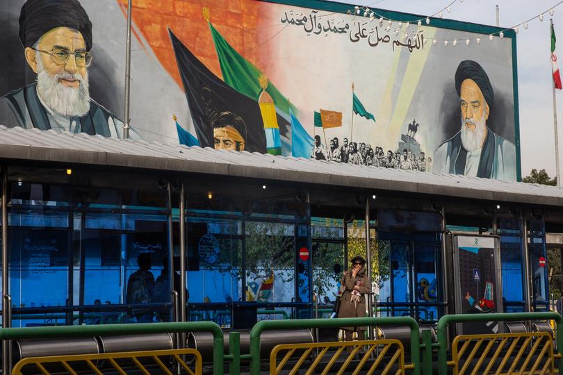 A patriotic billboard in Tehran on Saturday, Oct. 26, 2024, after Israel targeted multiple Iranian military facilities with airstrikes overnight. IsraelÕs retaliatory attack on Iran on Saturday morning marked the start of a new and more dangerous phase in the two countriesÕ yearslong conflict, but it appeared, at least for now, to have stopped short of prompting an all-out war, analysts said. (Arash Khamooshi/The New York Times)