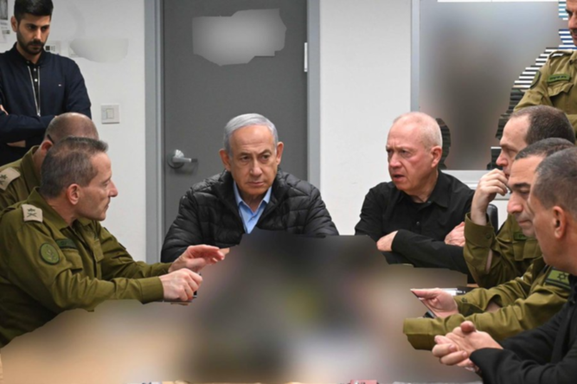 Israeli Prime Minister Benjamin Netanyahu with Israel’s Defence Minister Yoav Gallant and other military officials in a bunker in Tel Aviv’s Kirya military base early Saturday local time. 