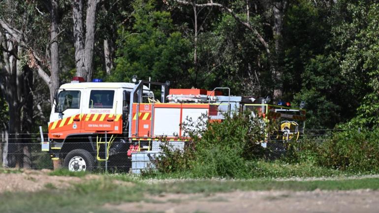 Investigations into a fatal plane crash near Sydney have been hampered by fire. (Dean Lewins/AAP PHOTOS)