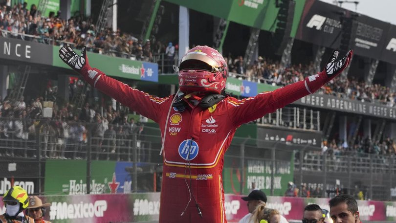 Ferrari's Carlos Sainz celebrates his victory in the Mexico City Grand Prix.