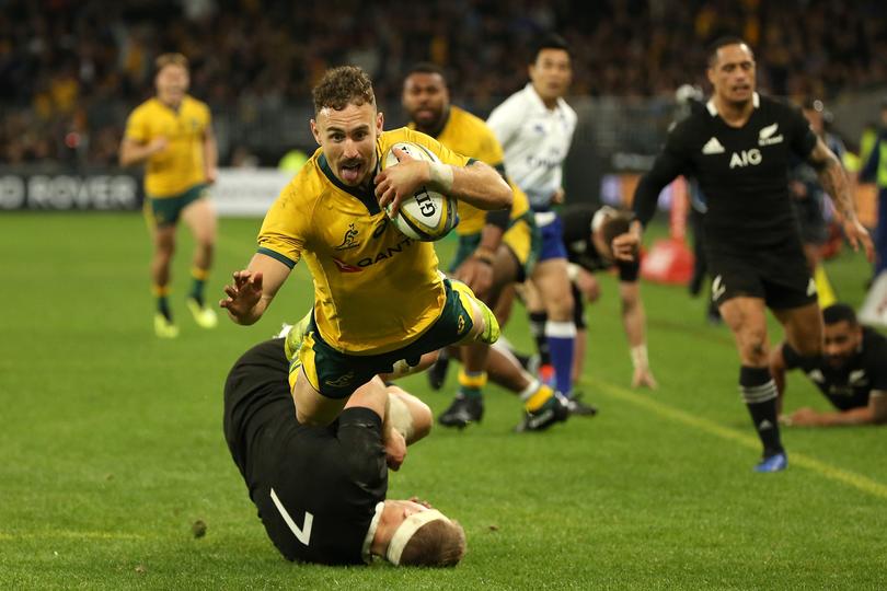 PERTH, AUSTRALIA - AUGUST 10: Nic White of the Wallabies dives in for a try during the 2019 Rugby Championship Test Match between the Australian Wallabies and the New Zealand All Blacks at Optus Stadium on August 10, 2019 in Perth, Australia. (Photo by Paul Kane/Getty Images)