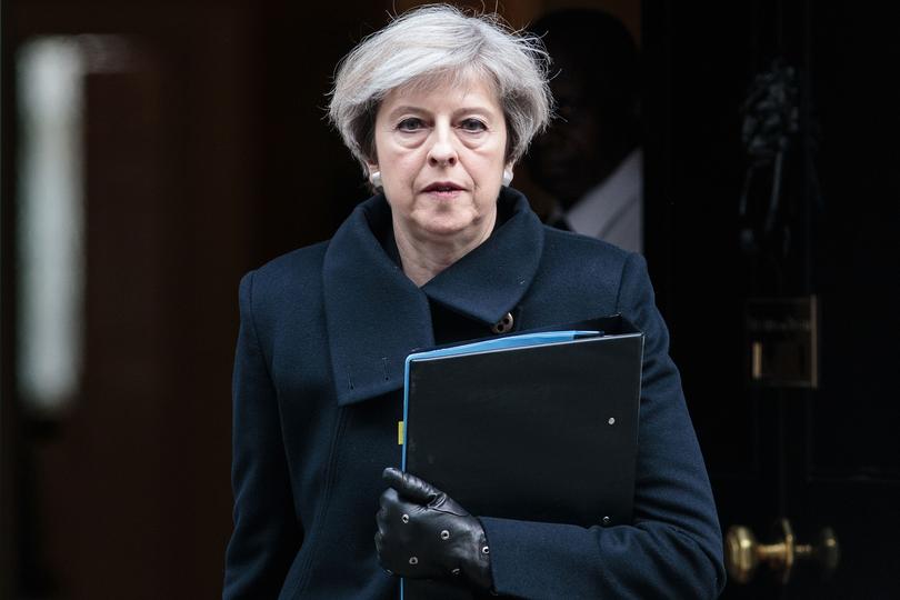 LONDON, ENGLAND - MARCH 23:  Prime Minister Theresa May leaves Downing Street on March 23, 2017 in London, England. The British Prime Minister Theresa May spoke last night after a terrorist attack took place in Westminster, saying Parliament would meet as normal today and "We will come together as normal".  PC Keith Palmer and three others lost their lives in the attack and the perpetrator was shot dead by police.  (Photo by Jack Taylor/Getty Images)