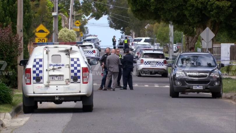Police have arrested a man after the body of a woman was located in an outer suburb early on Monday.